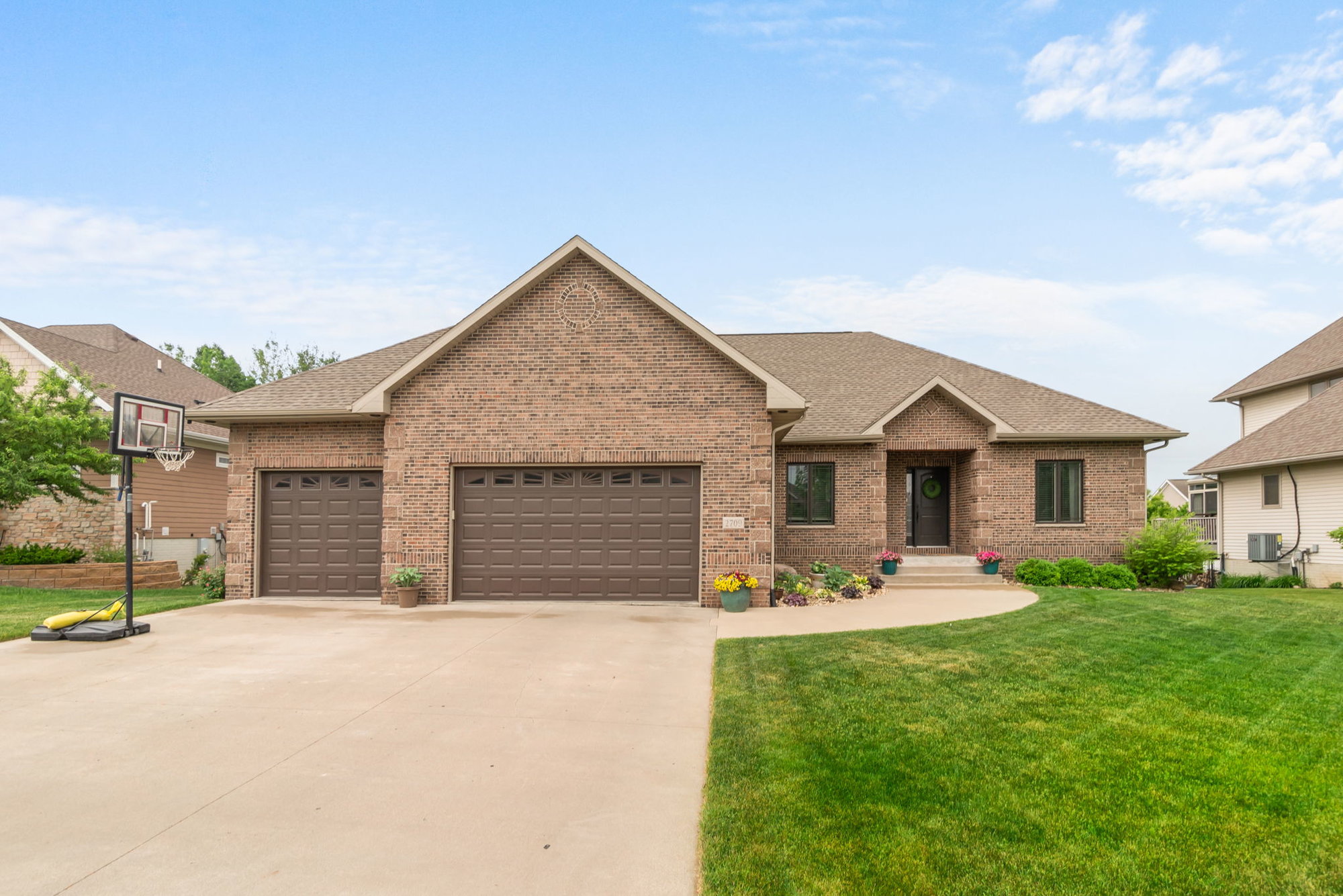 Comfort Meets Style in this Stunning Brick Ranch Home Located the Cedar Falls Ridges Neighborhood